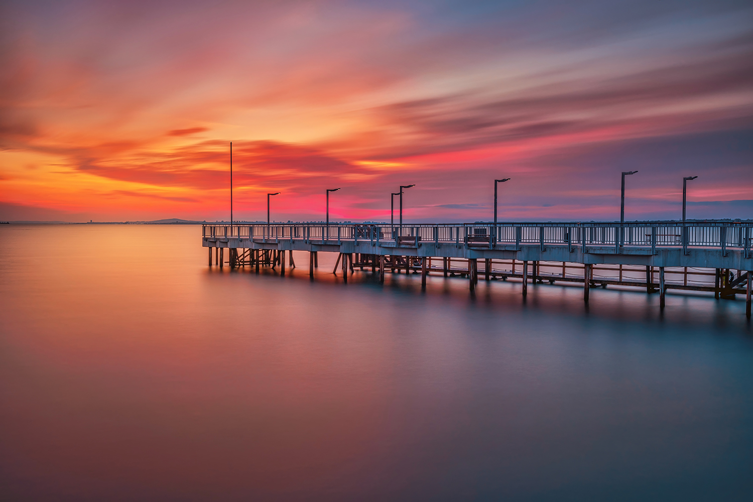 photo "Sunset over the pier" tags: landscape, nature, architecture, clouds, outdoors, pier, reflection, sea, sky, sunset