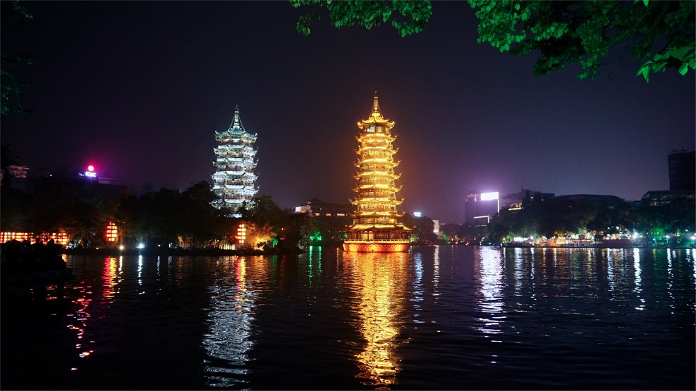 photo "NIGHT OF GUILIN" tags: architecture, travel, city, Asia, clouds, flowers, guilin, lake, mountains, night, sun, sunset, water